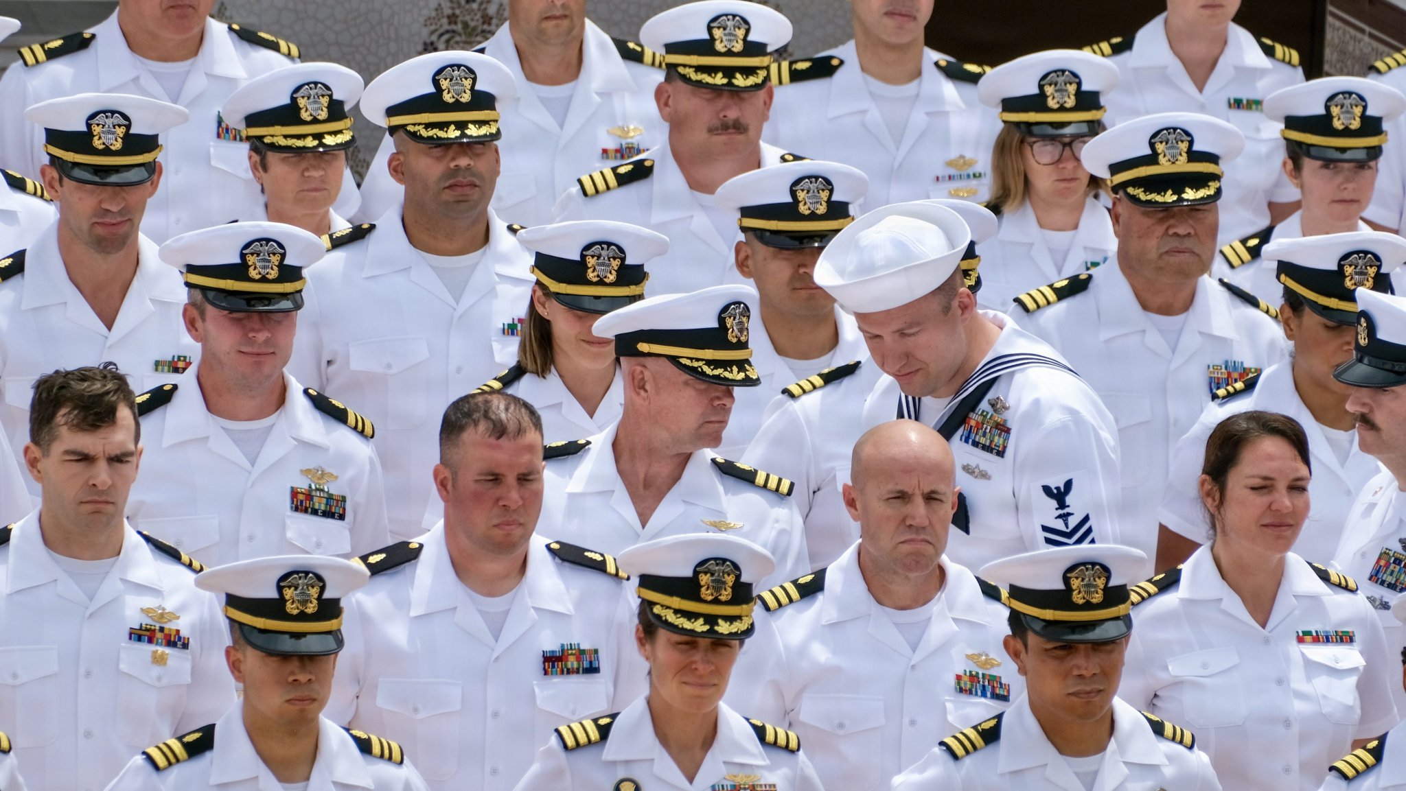 260422-N-FT324-8777. ROTA, SPAIN (April 23, 2026)- U.S. Navy Sailors stand in formation during a dress white uniform inspection at Naval Station Rota. The Sailors are inspected to ensure uniform standards, attention to detail, and overall readiness. The inspection reflects the professionalism, discipline, and pride Sailors take in their service while highlighting the teamwork that supports the mission at NMRTC Rota. (U.S. Navy photo by Mr. Everett Lopez)