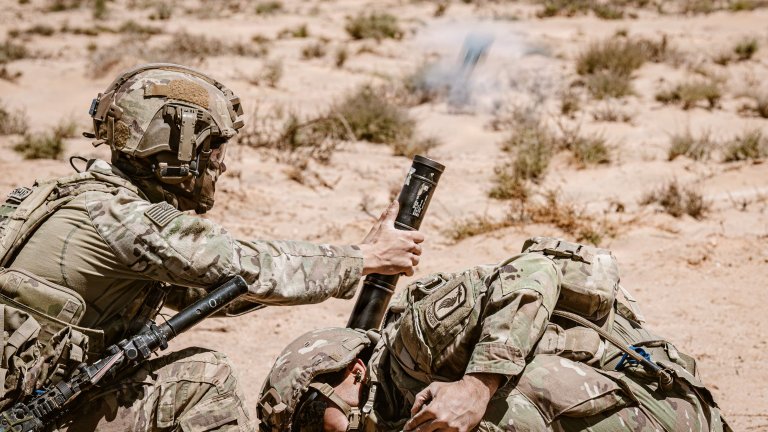 Image:  U.S. Soldiers assigned to MoD Company, 1st Battalion, 503rd Infantry Regiment, 173rd Mobile Brigade Combat Team (Airborne), fire mortars down range during an African Lion 26 counterattack exercise at Cap Draa, Tan-Tan, Morocco, May 4, 2026. The command field exercise counterattack lane tested new combined arms breach tactics by synchronizing unmanned ground vehicles, remote systems and maneuver elements, demonstrating the integration of autonomous and conventional forces to create standoff, reduce risk and generate new tactical possibilities on the modern battlefield. Army photo by Sgt. Christopher Sanchez 