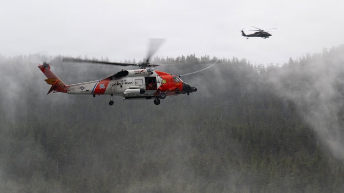 Image: A U.S. Coast Guard MH-60 Jayhawk helicopter crew with Air Station Sitka and A U.S. Army National Guard UH-60L Black Hawk helicopter crew from Juneau, Alaska, fly near each other during a mass casualty exercise near Sitka, Alaska, April 16, 2026. The helicopter crews rescued a large number of training participants that simulated distress in difficult to navigate areas during a large joint exercise involving multiple government agencies and local organizations. (U.S. Coast Guard photo by Petty Officer 2nd Class John Hightower) 