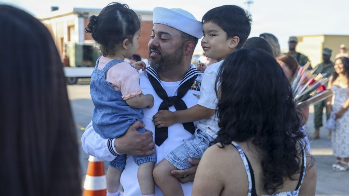 NAVAL STATION ROTA, Spain (June 1, 2026) - Operations Specialist 1st Class Javier Calix, assigned to Arleigh Burke-class guided-missile destroyer USS Bulkeley (DDG 84), embrace his family after the ship’s return to its homeport of Naval Station Rota, Spain, June 1, 2026. Bulkeley returned from a scheduled deployment in support of U.S. Naval Forces Europe-Africa strategic objectives and U.S., Allied, and partner interests. As the "Gateway to the Mediterranean,” NAVSTA Rota provides U.S. and Allied forces a strategic hub for operations wherever and whenever they are needed. NAVSTA Rota is a force multiplier, capable of promptly deploying and sustaining combat-ready forces through land, air, and sea, supporting warfighters and their families, and fostering the U.S. and Spanish relationship. (U.S. Navy photo by Mass Communication Specialist 3rd Class Jackson Wanous)