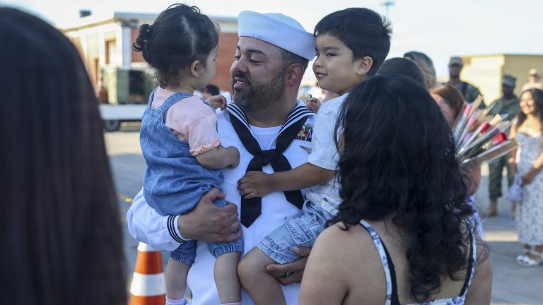NAVAL STATION ROTA, Spain (June 1, 2026) - Operations Specialist 1st Class Javier Calix, assigned to Arleigh Burke-class guided-missile destroyer USS Bulkeley (DDG 84), embrace his family after the ship’s return to its homeport of Naval Station Rota, Spain, June 1, 2026. Bulkeley returned from a scheduled deployment in support of U.S. Naval Forces Europe-Africa strategic objectives and U.S., Allied, and partner interests. As the "Gateway to the Mediterranean,” NAVSTA Rota provides U.S. and Allied forces a strategic hub for operations wherever and whenever they are needed. NAVSTA Rota is a force multiplier, capable of promptly deploying and sustaining combat-ready forces through land, air, and sea, supporting warfighters and their families, and fostering the U.S. and Spanish relationship. (U.S. Navy photo by Mass Communication Specialist 3rd Class Jackson Wanous)
