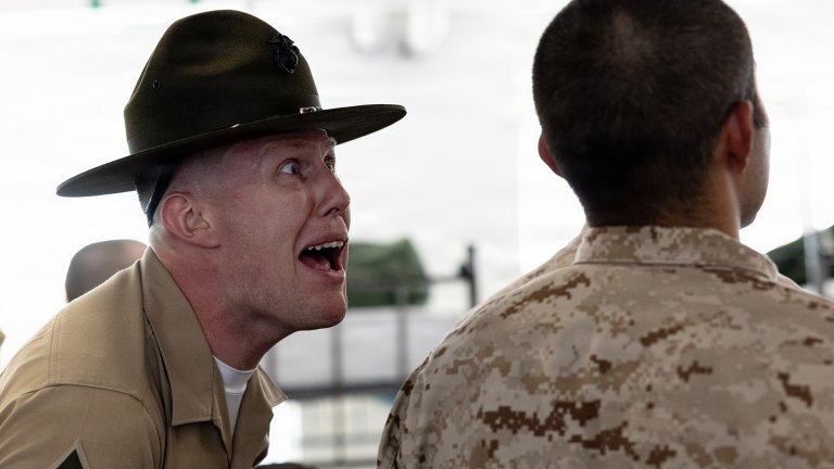 U.S. Marine Corps Sgt. Zachary Strader, a drill instructor with Mike Company, 3rd Recruit Training Battalion, instructs recruits during Pick-Up Day at Marine Corps Recruit Depot San Diego, California, May 30, 2026. Pick-Up Day signifies the first official day of training in which recruits will meet their drill instructor team for the first time, prepare their gear and squad bays, and expectations are set for the remainder of their time in recruit training. (U.S. Marine Corps photo by Cpl. Evelyn Doherty)