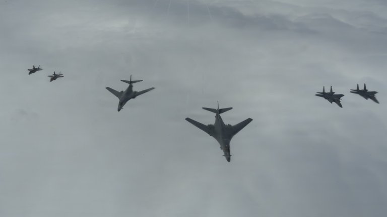U.S. Air Force B-1B Lancers, F-15E Strike Eagles, and F-35A Lightning IIs fly in a formation during Astral Knight 26 over the North Sea, June 8, 2026. Aerial refueling operations increase the range and endurance of combat aircraft, supporting tactical integrated air and missile defense and tactical command and control during AK26. (U.S. Air Force photo by Staff Sgt. Nash Truitt)  Caption: Air Force B-1B bombers, F-15E Strike Eagles and F-35A Lightning IIs fly over the North Sea on June 8, 2026 as part of the Astral Knight 26 exercise. U.S. Air Force photo by Staff Sgt. Nash Truitt