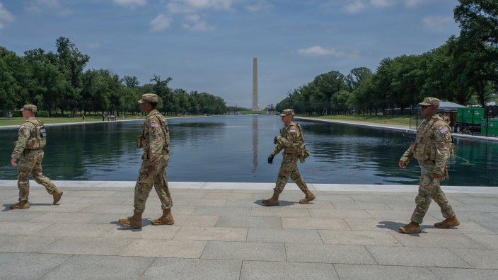 From left, U.S. Army Sgt. Andrew Guthrie, Spc. Terrance Echols, Spc. Charles Wheaton, and Pfc. Labrannon Hughes, all assigned to 890th Engineer Battalion, Mississippi National Guard, Joint Task Force Magnolia, patrol in front of the Lincoln Memorial Reflecting pool in Washington, D.C., June 10, 2026. Approximately 3,000 National Guard members support the DC Safe and Beautiful mission, providing critical assistance to the Metropolitan Police Department and community partners to enhance safety and quality of life throughout the District. (U.S. Army National Guard photo by Sgt. Christian Brown) 
