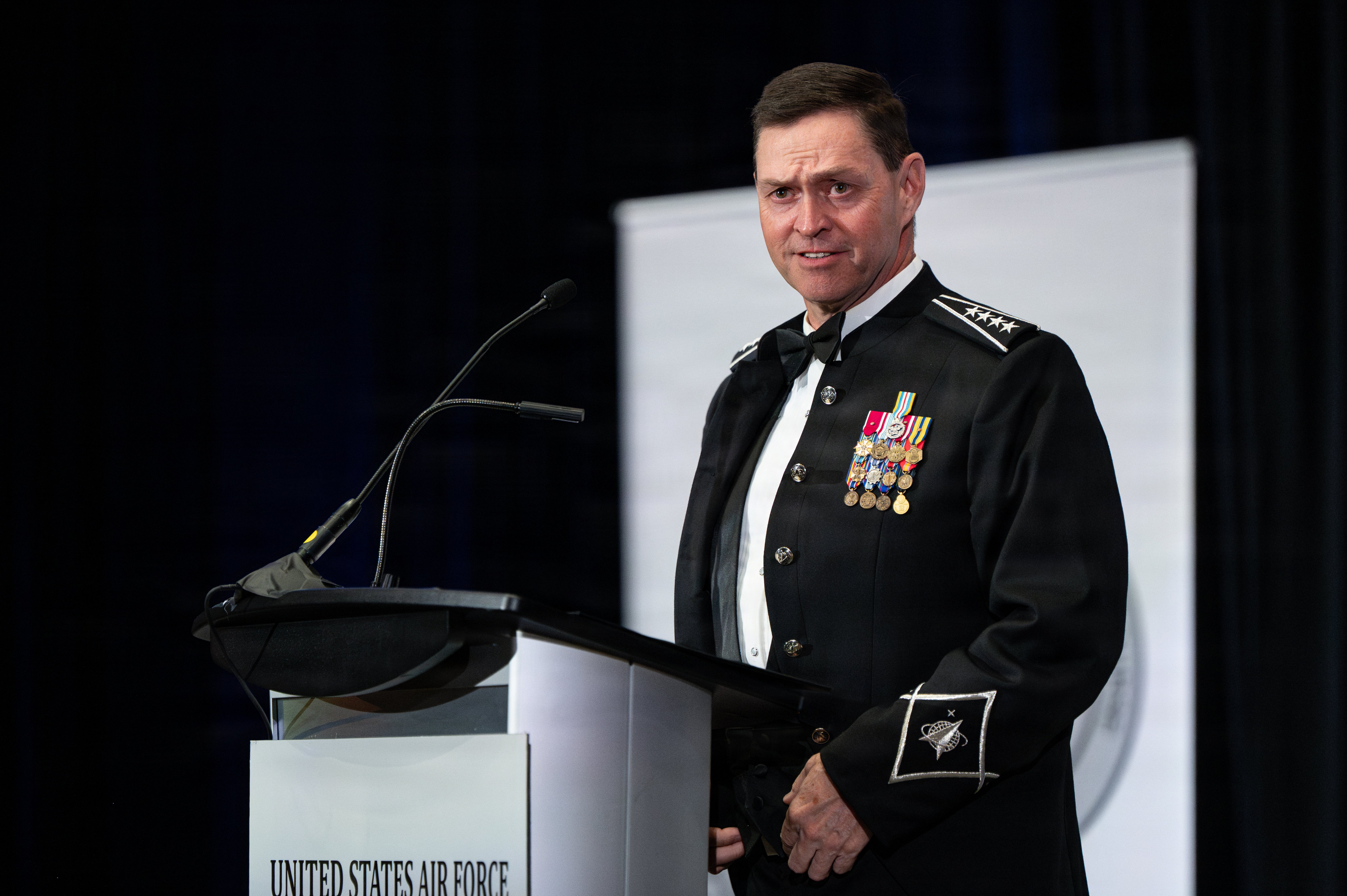 U.S. Space Force Chief of Space Operations Gen. Chance Saltzman delivers remarks as the guest speaker during the U.S. Air Force Weapons School graduation in Las Vegas, Nevada, June 13, 2026. As the first Guardian to ever serve as graduation speaker, Saltzman emphasized the importance of integrating air and space capabilities to meet the demands of future conflict. (U.S. Air Force photo by Airman 1st Class Bella Swarr)
