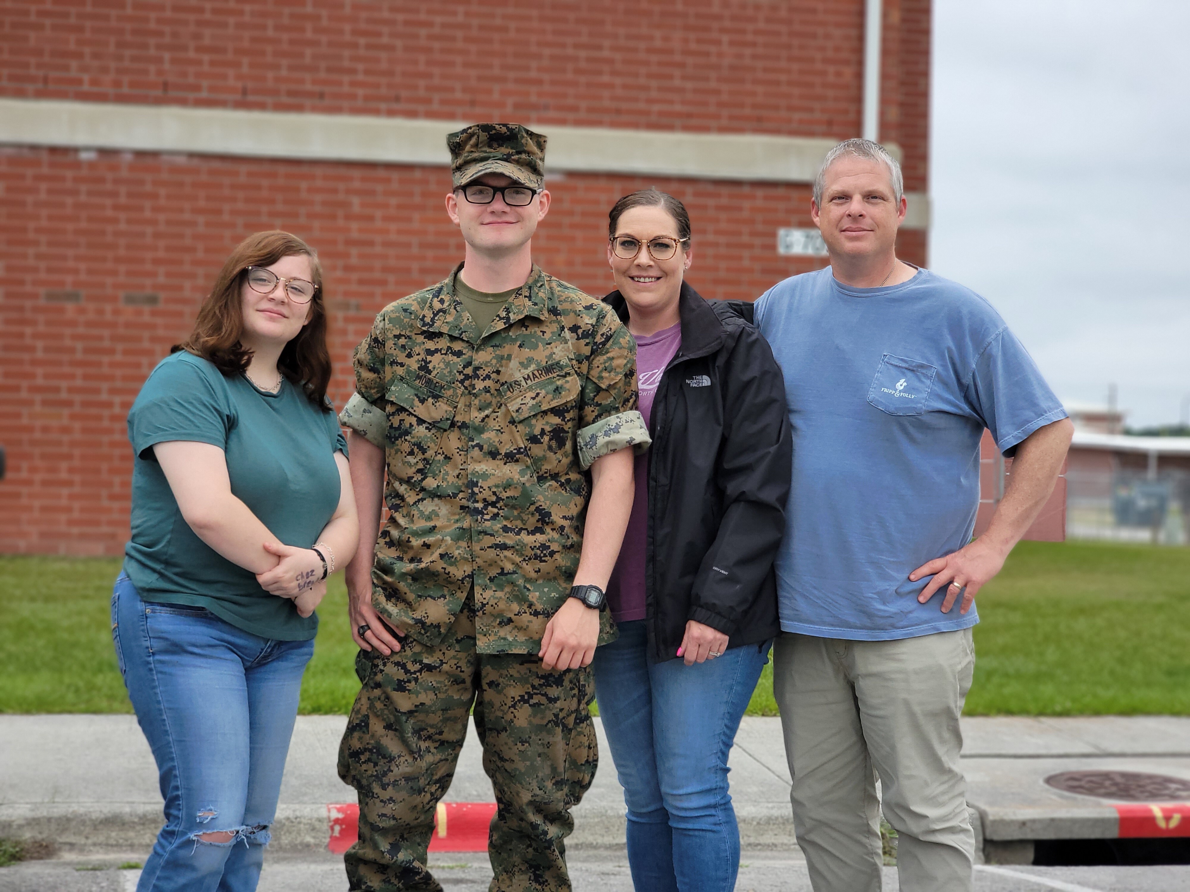 The Mobleys, sister Emma, left, mom April, and dad Joseph, visited Drew in May 2022 when he was training at Marine Corps Air Station New River in North Carolina.