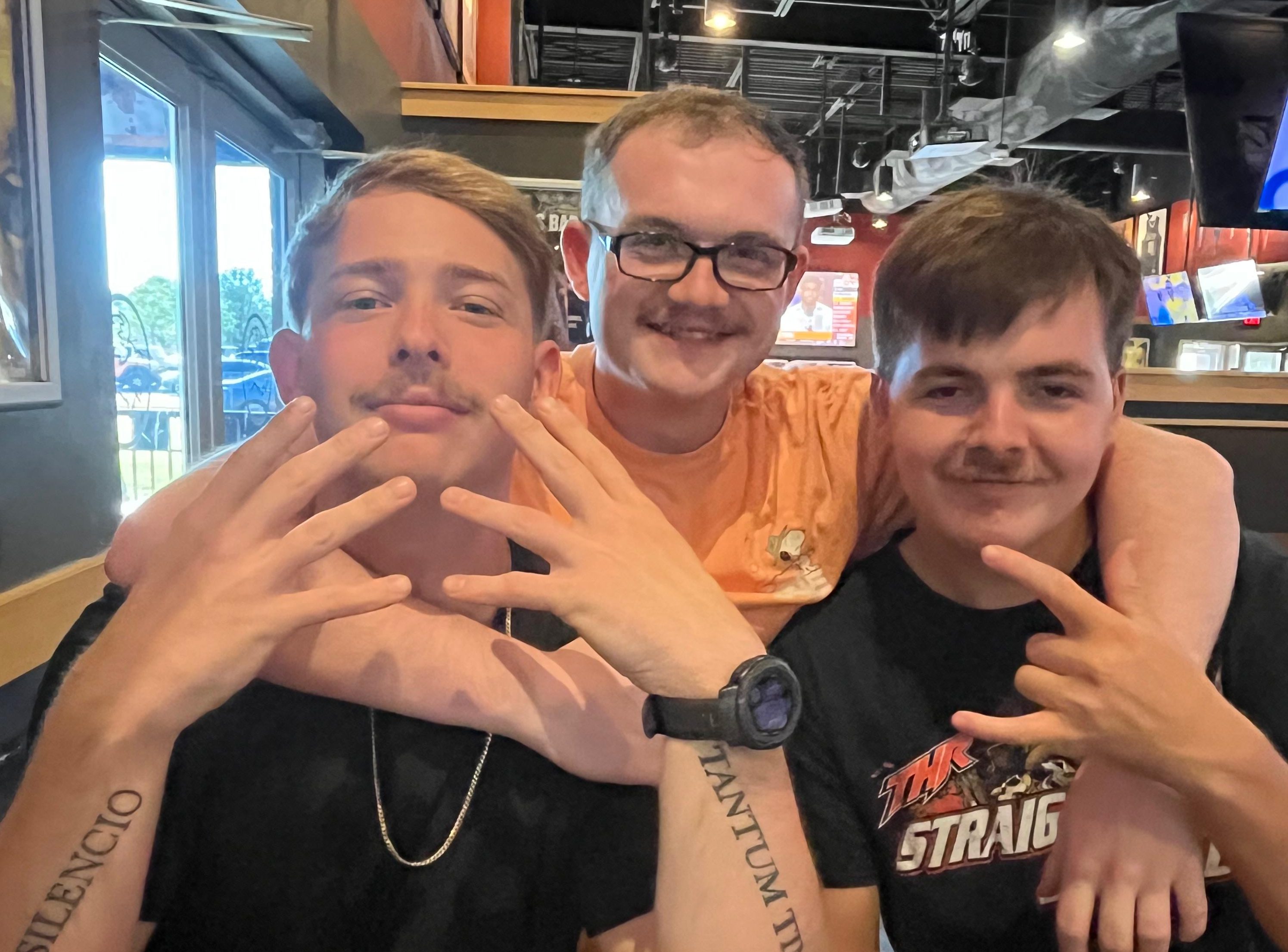 Drew Mobley, center, enjoys an outing with fellow Marines Sgt. Warren Engdahl, left, and Cpl. Michael Snell. Engdahl was among a group of Marines who discovered Drew’s body after friends tracked his location on Snapchat.