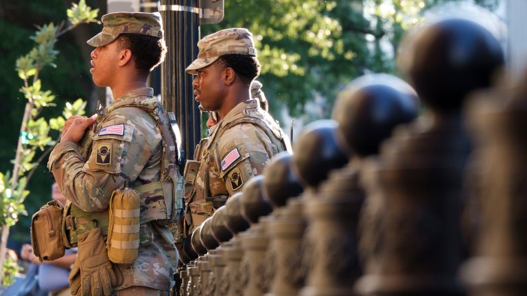 WASHINGTON, DC - JUNE 3: Members of the National Guard stand near the White House on June 3, 2026 in Washington, DC. (Photo by Kevin Carter/Getty Images)