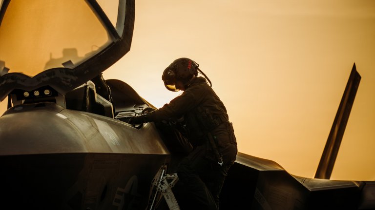 A U.S. Sailor enters an F-35C Lightning II attached to Strike Fighter Squadron (VFA) 147 on the flight deck aboard Nimitz-class aircraft carrier USS George Washington (CVN 73), Oct. 15, 2026. George Washington is deployed to the U.S. 5th Fleet area of operations to support maritime security and stability in the Middle East. (U.S. Navy photo)