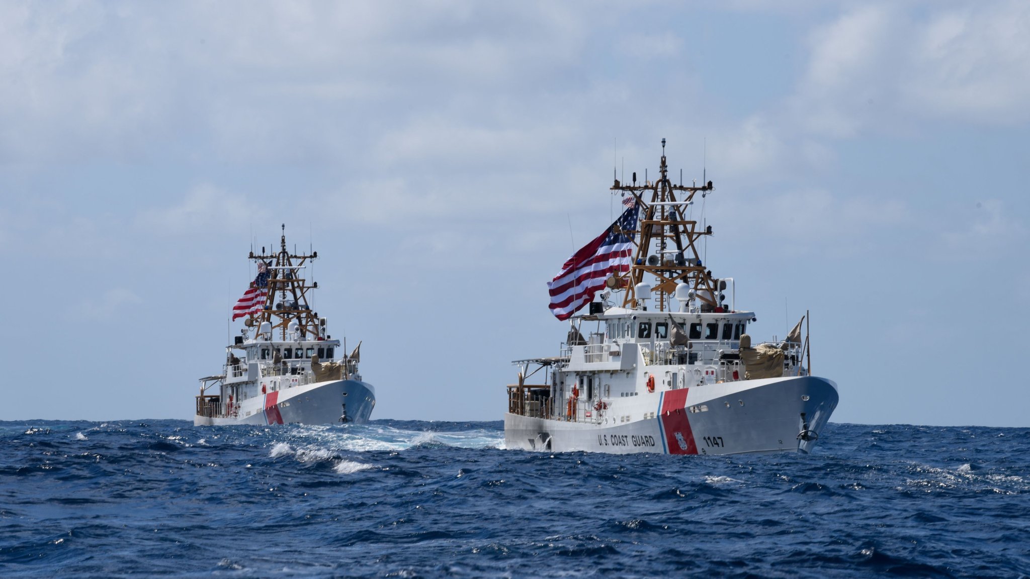 The USCGC Clarence Sutphin Jr. (WPC 1147) John Scheuerman (WPC 1146) sail across the Atlantic Ocean, June 22, 2022. The Clarence Sutphin Jr. is the U.S. Coast Guard’s sixth 154-foot Sentinel-class cutter assigned to Patrol Forces Southwest Asia and will be homeported in Manama, Bahrain. (U.S. Coast Guard photo by Petty Officer 3rd Class Jessica Fontenette) 