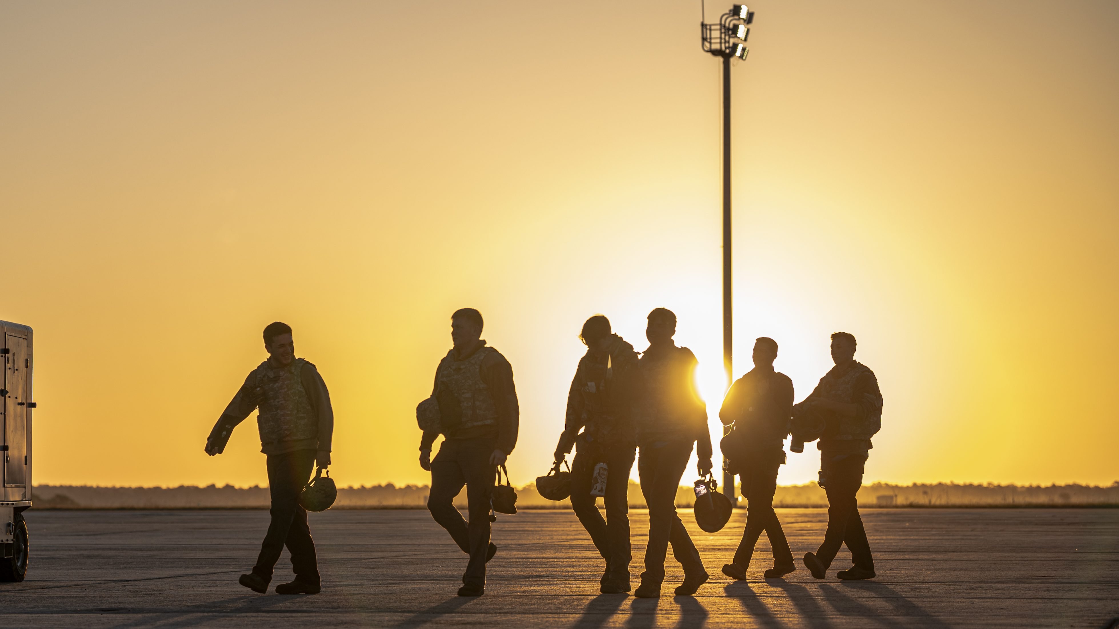 U.S. Air Force Airmen assigned to the 74th Fighter Generation Squadron walk on the flightline during Exercise Ready Tiger 24-1 at Avon Park Air Force Range, Florida, April 13, 2024. Crew chiefs ensure each aircraft is ready to execute the mission anytime, anywhere. Ready Tiger 24-1 is a readiness exercise demonstrating the 23rd Wing’s ability to plan, prepare and execute operations and maintenance to project air power in contested and dispersed locations, defending the United States’ interests and allies. (U.S. Air Force photo by Airman 1st Class Leonid Soubbotine)