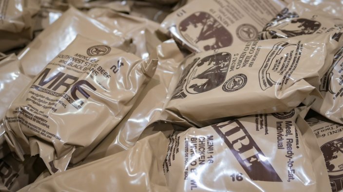 A supply of Meals Ready-to-Eat (MREs) is prepared for distribution to 944th Fighter Wing Reserve Citizen Airmen during Exercise Desert Hammer 25-1 at Luke Air Force Base, Ariz., Nov. 13, 2024. Set against the unmatched backdrop of the Barry M. Goldwater Range, Desert Hammer leverages Arizona’s strategic geography to provide realistic combat training for U.S. and allied forces. (U.S. Air Force photo by Tech. Sgt. Tyler J. Bolken)
