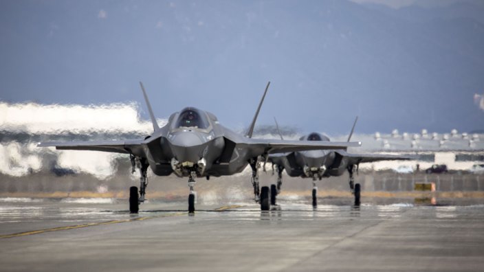 U.S. Marine Corps F-35B Lightning II aircraft with Marine Fighter Attack Squadron (VMFA) 214, Marine Aircraft Group 13, 3rd Marine Aircraft Wing taxi the flight line after arriving at Marine Corps Air Station Iwakuni, Japan, March 8, 2025. VMFA-214, an F-35B squadron from MCAS Yuma, Arizona, deployed to augment MAG-12, 1st MAW under the Unit Deployment Program, which provides U.S.-based units with operational experience in the Indo-Pacific. Their arrival marked the start of the Marine Corps’ transition from the F/A-18 Hornet to the F-35 for rotational deployments to the region. (U.S. Marine Corps photo by Cpl. Samantha Rodriguez)