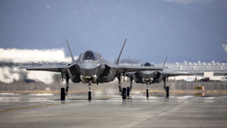 U.S. Marine Corps F-35B Lightning II aircraft with Marine Fighter Attack Squadron (VMFA) 214, Marine Aircraft Group 13, 3rd Marine Aircraft Wing taxi the flight line after arriving at Marine Corps Air Station Iwakuni, Japan, March 8, 2025. VMFA-214, an F-35B squadron from MCAS Yuma, Arizona, deployed to augment MAG-12, 1st MAW under the Unit Deployment Program, which provides U.S.-based units with operational experience in the Indo-Pacific. Their arrival marked the start of the Marine Corps’ transition from the F/A-18 Hornet to the F-35 for rotational deployments to the region. (U.S. Marine Corps photo by Cpl. Samantha Rodriguez)