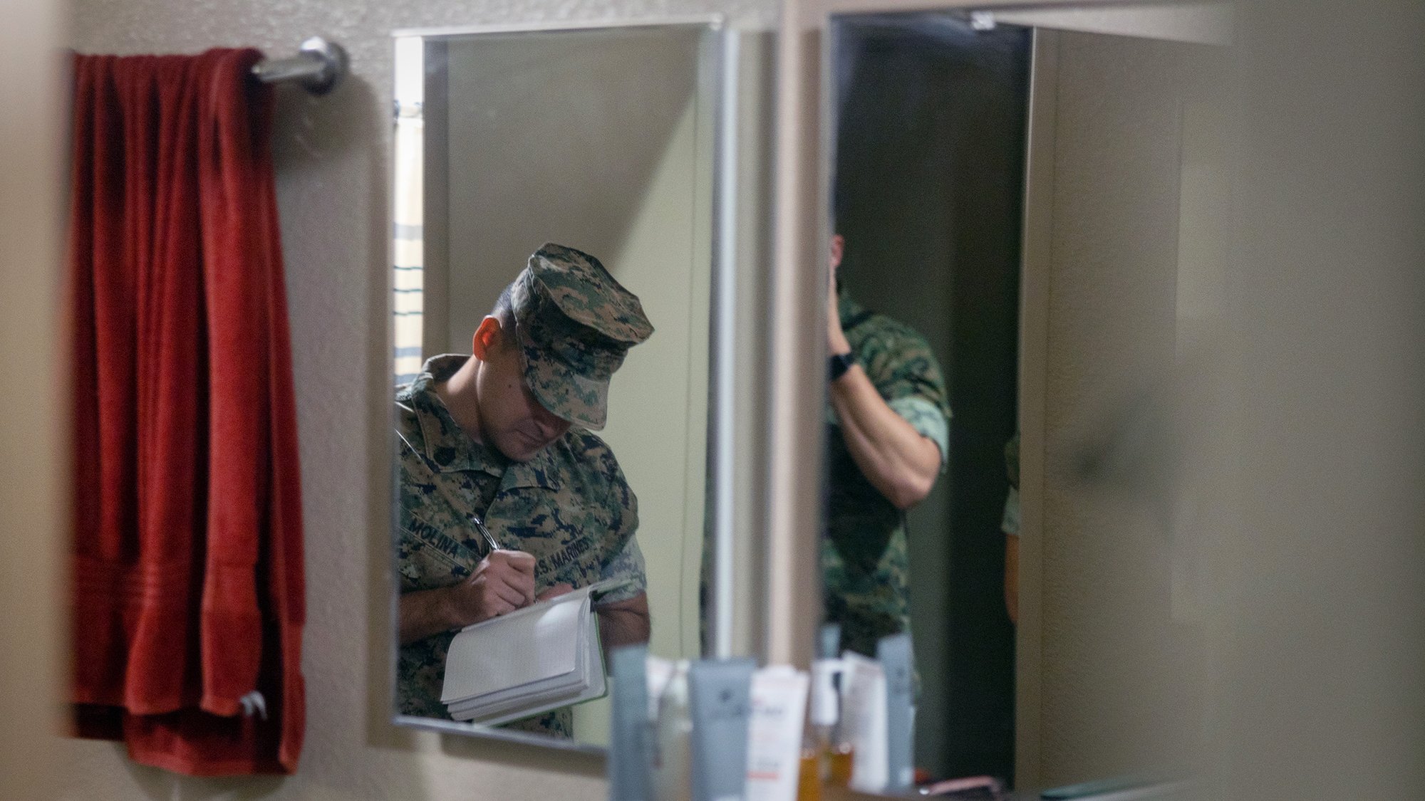 U.S. Marine Corps Gunnery Sgt. Rony Molina, a spectrum manager with I Marine Expeditionary Force, records discrepancies during a barracks inspection in support of Operation Clean Sweep II at Marine Corps Base Camp Pendleton, California, March 24, 2025. Part of the larger Barracks 360 Reset initiative, OCS II builds upon the success of the first iteration by sustaining elevated barracks conditions and further transforming our organizational culture by reinvesting our time, resources, training and efforts into the barracks. Molina is a native of El Paso, Texas (U.S. Marine Corps photo by Lance Cpl. Jordan Searls)