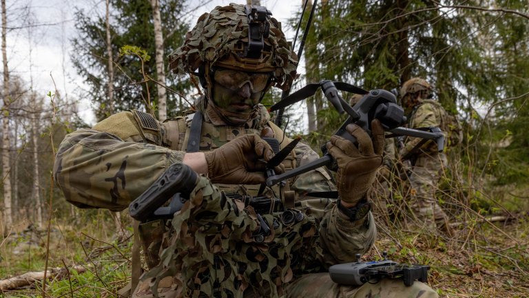 U.S. Army Spc. Parker Gamble, an infantryman assigned to 1st Battalion, 12th Cavalry Regiment, operates a DJI Mavic 3 during a live-fire exercise in Selija, Latvia, April 29, 2026. During the exercise, squads deployed drones to conduct reconnaissance as teams bounded forward to attack different simulated objectives. At the same time, a Titan V3 counter-unmanned aircraft system was used to detect and jam enemy drones, providing aerial support from a distance. The training prepares Soldiers for modern battlefields by integrating new technology and refining strategies to counter diverse scenarios, strengthening warfighting capability and readiness to deter threats along NATO’s eastern flank. (U.S. Army photo by Spc. Gabriel Martinez)