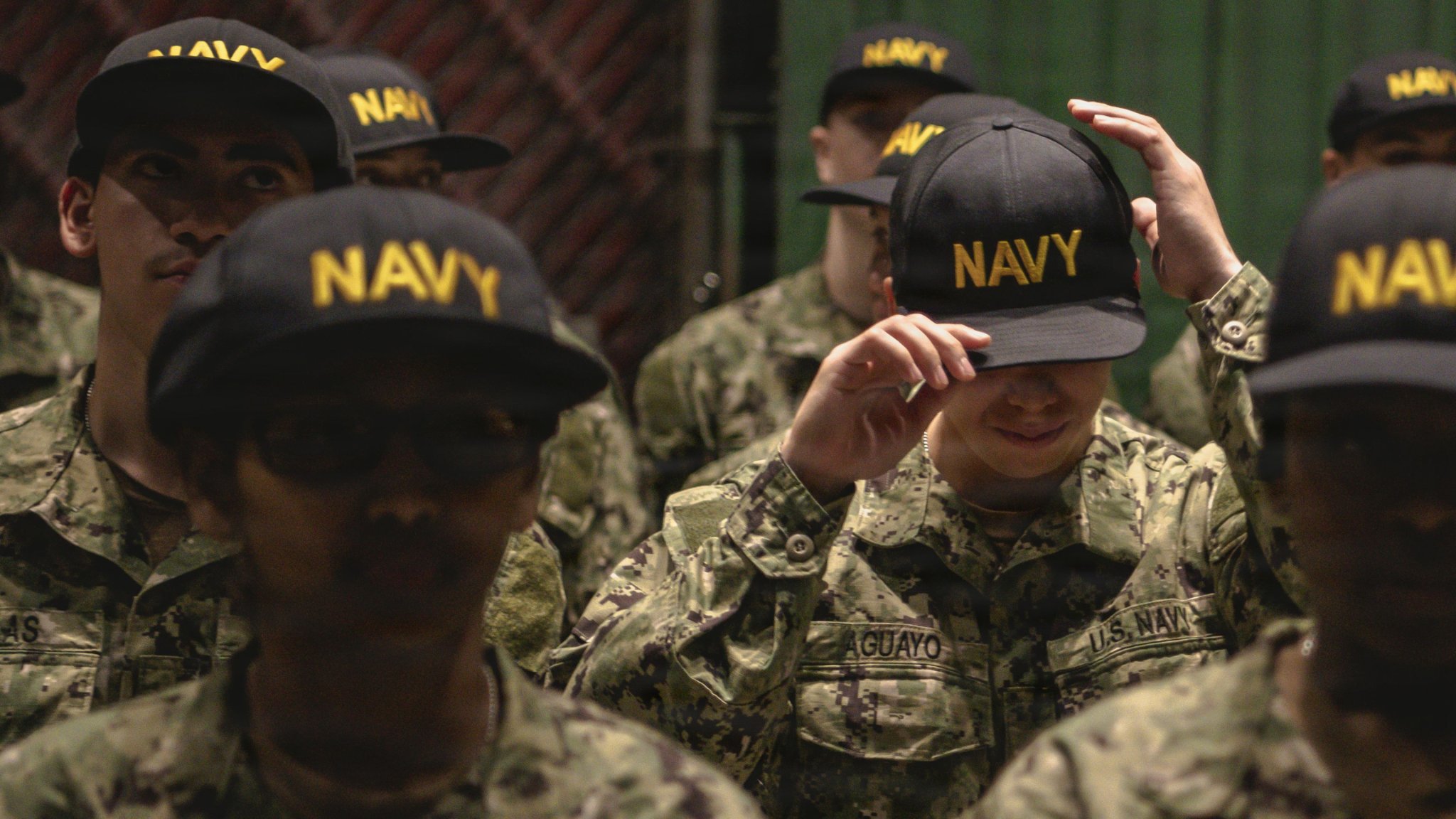 Image: 260507-N-KL637-1069 GREAT LAKES, Ill. (May 7, 2026) – Capt. Christopher Williams, assistant judge advocate general of the Navy for education, training, and professional development, attends the capping ceremony at Recruit Training Command. The capping ceremony marks recruits becoming Sailors at the end of RTC’s crucible event, Battle Stations. More than 40,000 recruits train annually at the Navy's only boot camp. (U.S. Navy photo by Mass Communication Specialist 2nd Class Stuart Posada) 