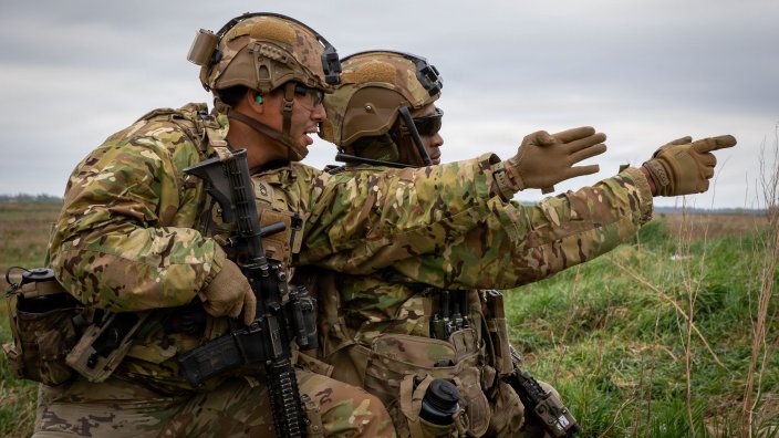 U.S. Army Sgt. First Class Eric Hernandez and Staff Sgt. Nicholas Stone, assigned to Bull Troop 1, 2nd Cavalry Regiment, discuss possible target locations during a live fire exercise taking place near Bemowo Piskie Training Area, Poland, May 7, 2026. From April 27 to May 31, 2026, U.S. and Allied forces will exercise the North Atlantic Treaty Organization’s (NATO) Eastern Flank Deterrence Initiative, demonstrating NATO’s ability to fight and win on the modern battlefield. Nearly 15,000 troops from eleven nations will train across the High North, Baltic region, and Poland. They will execute rapid maneuvers, air defense, counter-drone operations, and cyber defense to validate NATO’s regional defense plans in real time. This series of linked exercises includes Saber Strike, Immediate Response, and Swift Response. The exercises turn investment into capability. Soldiers integrate unmanned systems such as AI-enabled command and control and live data networks to move, decide, and fight more effectively across all domains. Sword 26 demonstrates how U.S. Army Europe and Africa drives transformation at scale while strengthening deterrence. Together with our allies, we are building a unified, lethal force ready to defend NATO territory and respond to any threat. (U.S. Army Reserve photo by Spc. Thomas Madrzak)