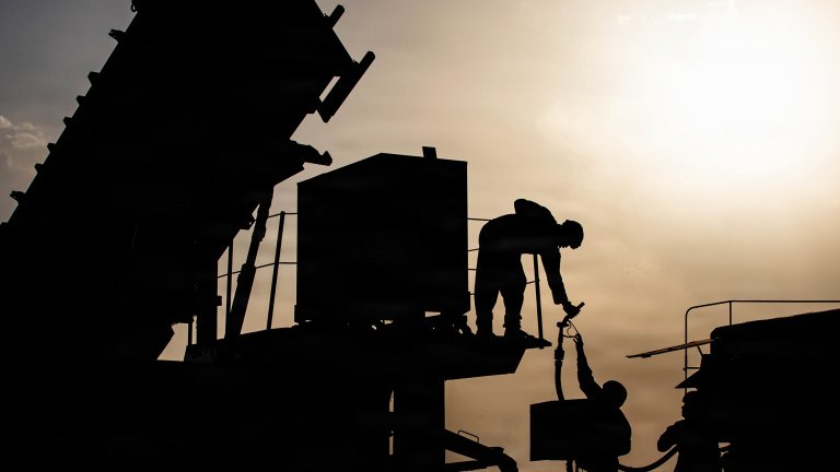 U.S. Army petroleum supply specialists prepare to fuel a generator for a Patriot missile system in the Middle East. Petroleum supply specialists ensure the continuous, rapid distribution of fuel necessary to maintain the readiness and mobility of all Army combat assets in theater. (U.S. Army photo)