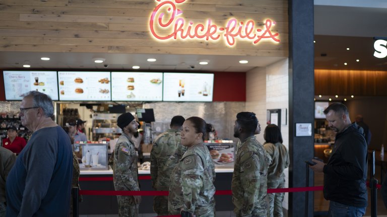 NEW BALTIMORE, NY - OCTOBER 21: US Army soldiers stand in line at a Chick-fil-A fast food outlet October 21, 2025 at the New Baltimore service restaurant along the I-87 highway in New York State. (Photo by Robert Nickelsberg/Getty Images)