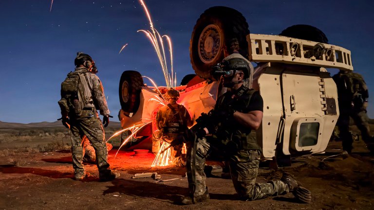 U.S. Air Force pararescuemen assigned to the 57th Rescue Squadron based out of Aviano Air Base, Italy, conduct a vehicle extraction of an isolated person during Exercise Savage Jackal at Playas, New Mexico, July 26, 2026. Vehicle extraction training enhanced the squadron's capability to recover isolated personnel from damaged vehicles while preparing rescue forces to respond to complex, real-world contingencies. (U.S. Air Force photo by Staff Sgt. Jenna A. Bond)