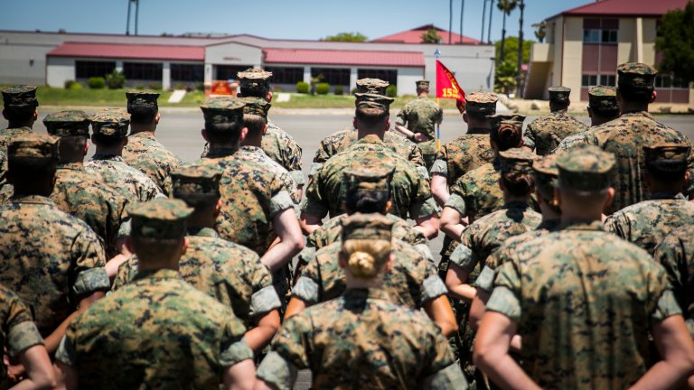 MARINE CORPS BASE CAMP PENDLETON, Calif. – Marines with the 15th Marine Expeditionary Unit stand at parade rest prior to a command brief at Camp Pendleton, May 19, 2017. Formations give the opportunity for senior enlisted and officers to inform the unit of operational and administrative matters, as appropriate. The 15th MEU is expected to be able to operate in a maritime environment, performing operations very similar to the training executed during work-up evolutions. (U.S. Marine Corps photo by Cpl. F. Cordoba)