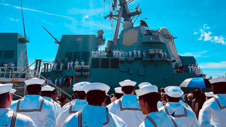 Sailors stand on the deck of the USS Thomas Hudner as the destroyer pulls into Naval Station Mayport on Aug. 9, 2026. Navy photo.