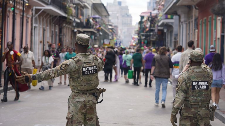 Louisiana National Guard Soldiers conduct crowd management operations in the French Quarter during peak Mardi Gras security operations in New Orleans, Feb. 17, 2026. More than 350 Guardsmen were activated in support of Operation NOLA Safe, assisting law enforcement partners with public safety efforts throughout the French Quarter Enhanced Security Zone during the Carnival season. (U.S. Army National Guard photo by Sgt. Danny Hough) 