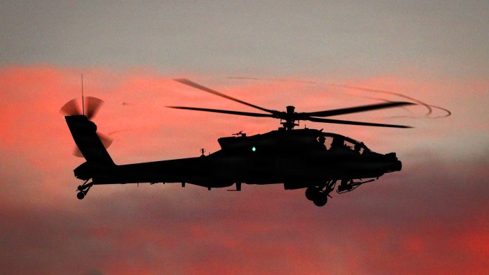An AH-64 Apache Helicopter flight crew assigned to 2nd Squadron, 6th Cavalry Regiment "Sabers", 25th Combat Aviation Brigade, execute an aerial gunnery designed to certify pilots on their weapons systems at Pohakuloa Training Area, Hawaii from February 2-25, 2026. Flight crews conduct gunnery tables which range from dry-fire, individual skills to live-fire, collective combat scenarios. An aerial gunnery is a semi annual requirement necessary to maintain proficiency of aircrews, and allows the unit to build a more reliable combat power. (U.S. Army Photo by Sgt. Olivia Cowart)