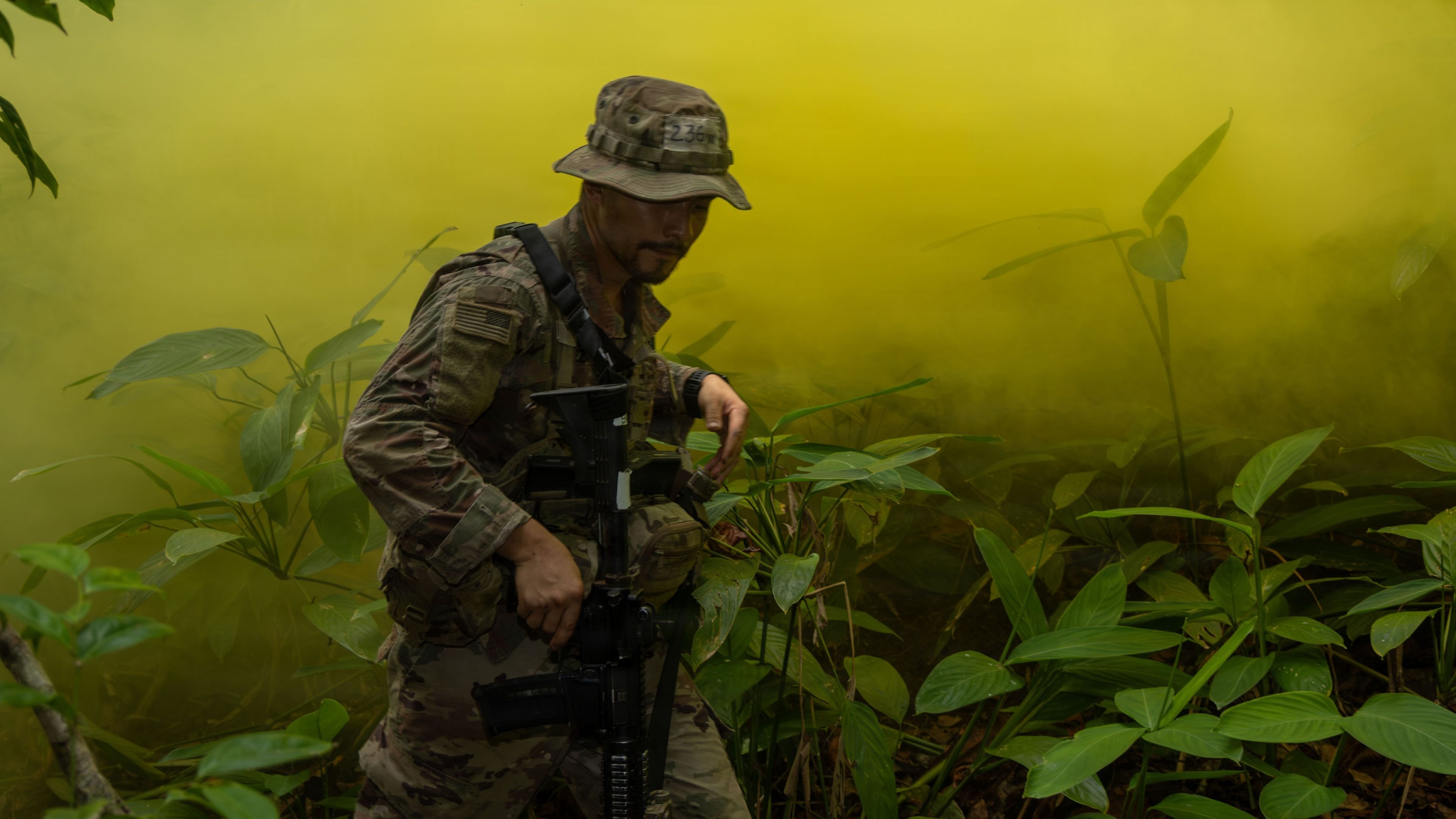 A U.S. Soldier moves through the jungle while securing the objective area after engaging opposing forces during an ambush lane as part of the Jungle Operations Training Course–Panama culmination exercise at Aeronaval Base Cristóbal Colón, Panama, May 14, 2026. The exercise tested participants’ ability to execute jungle warfare tactics, maintain security and operate effectively in a realistic high stress scenario. (U.S. Army photo by Sgt. Nirak Garcia Navarro)