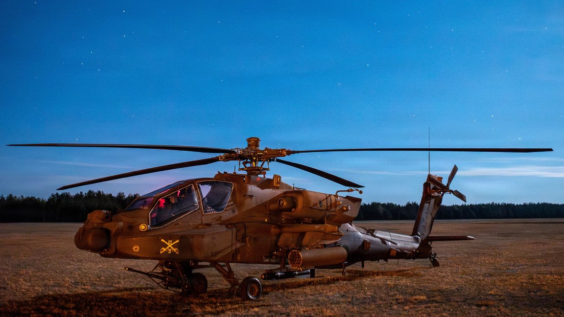 U.S. Army Soldiers assigned to 1-3 Attack Battalion, Task Force Vipers, conducted night gunnery tables with Joint Terminal Attack Controllers (JTACs) and U.S. Air Force Tactical Air Control Party (TACP) specialists at 21st Central Air Force Training Ground, Nadarzyce, Poland on May 10, 2026. The controllers verify target identification, confirm friend-or-foe positions and are authorized to give the "fire at will" command during air support missions. This training and coordination serves to set the standard for Apache helicopters operated by the Polish Armed Forces, which will train and certify at the base in the near future. (DoD Photos by Greg Czaplicki)