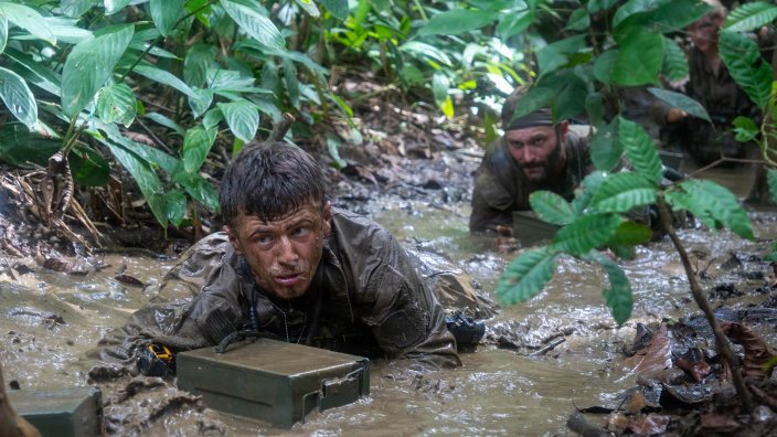 A U.S. Army service member, a candidate of Jungle Operation Training Course - Panama, high crawls during the green mile at Aeronaval Base Cristóbal Colón, Panamá, July 2, 2026. U.S. Southern Command is focused on increasing partner nation capacity and interoperability in the region and reflects the United States’ enduring promise of friendship, partnership and solidarity with the Panamanian people. (U.S. Army photo by Pfc. Carolyn Dodge)