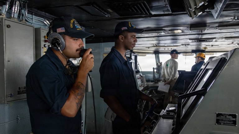 U.S. Sailors stand watch aboard Nimitz-class aircraft carrier USS Abraham Lincoln (CVN 72), July 14, 2026. Abraham Lincoln is deployed to the U.S. 5th Fleet area of operations to support maritime security and stability in the Middle East. (U.S. Navy photo) 