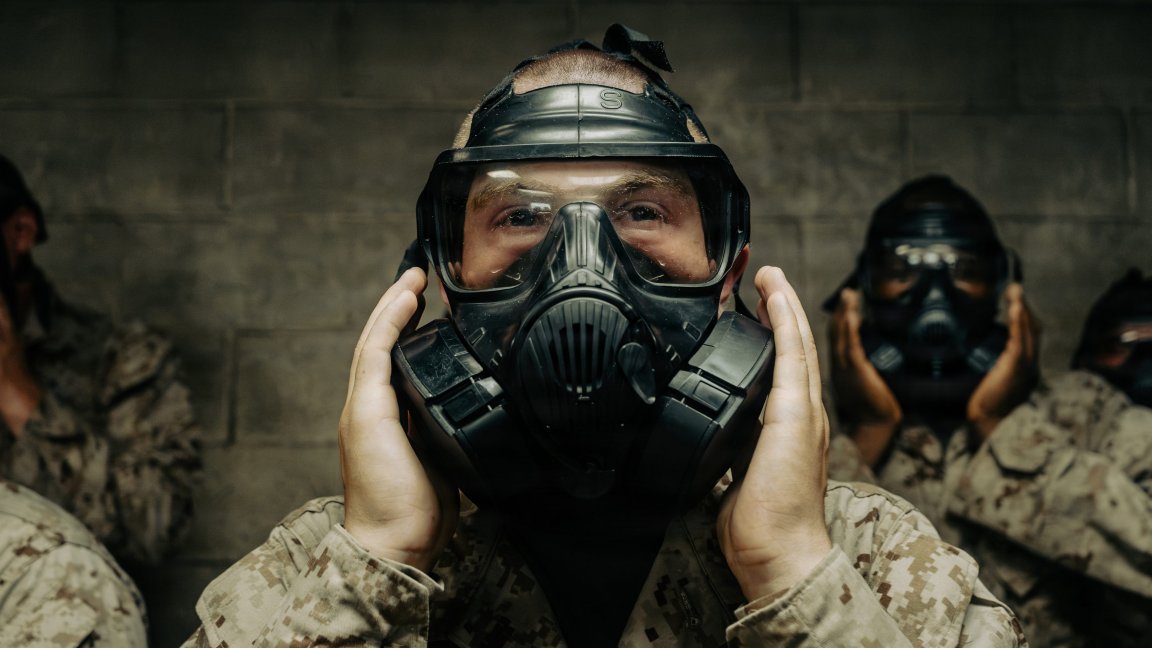 U.S. Marine Corps Rct. John Romano, a recruit with India Company, 3rd Recruit Training Battalion, clears his gas mask of gas agents in the gas chamber during chemical, biological, radiological, and nuclear defense training on Marine Corps Recruit Depot Parris Island, S.C., July 17, 2026. Recruits are exposed to gas agents in order to familiarize themselves with the use of their gas masks and its capabilities. (U.S. Marine Corps photo by Cpl. Dylan Smith)