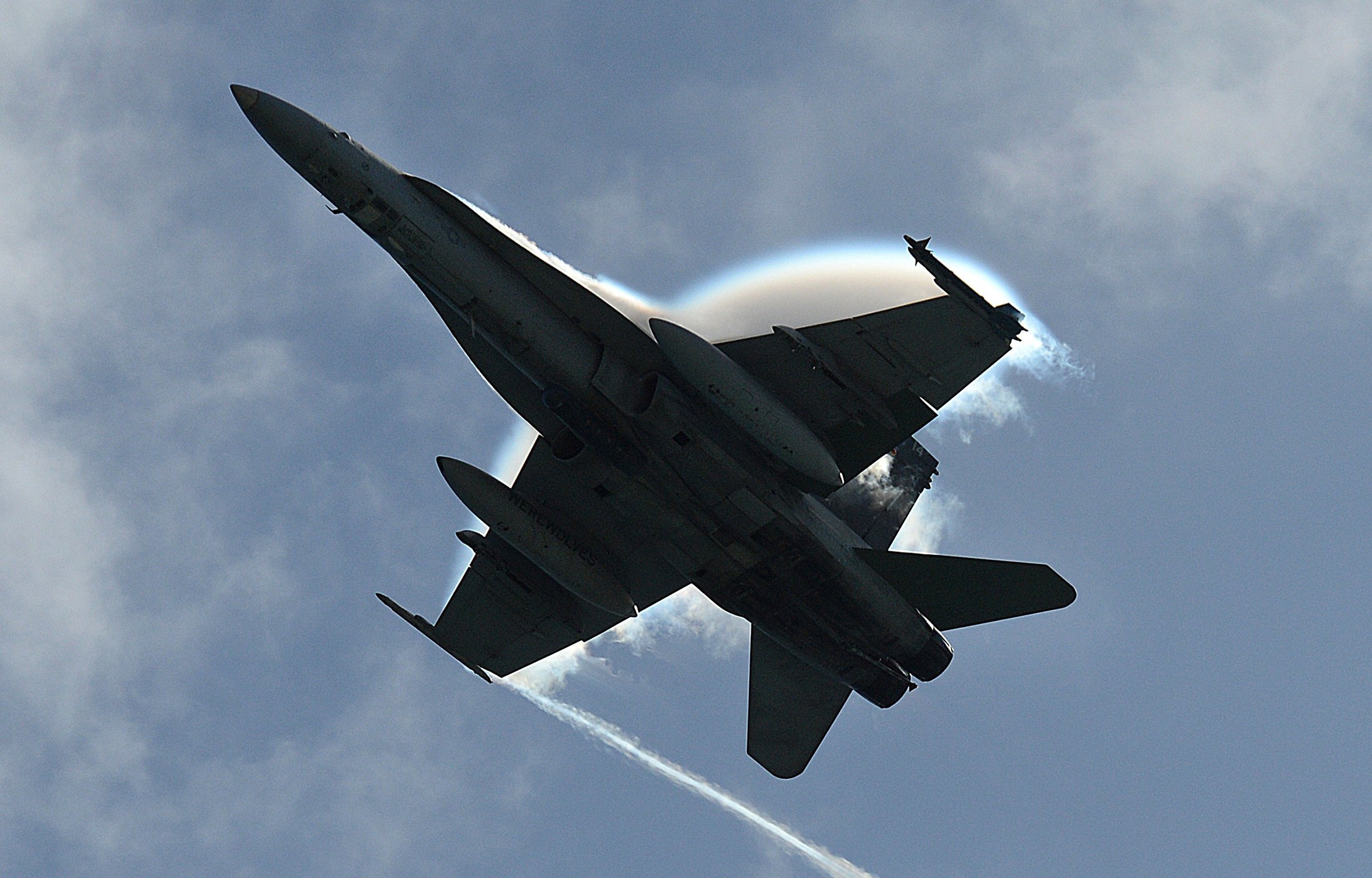 An F-18 fighter jet flies over Pyramid Beach during Rim of the Pacific (RIMPAC) Exercise 2014. Twenty-two nations, 49 ships and six submarines, more than 200 aircraft and 25,000 personnel are participating in RIMPAC exercise from June 26 to Aug. 1, in and around the Hawaiian Islands and Southern California. The world’s largest international maritime exercise, RIMPAC provides a unique training opportunity that helps participants foster and sustain the cooperative relationships that are critical to ensuring the safety of sea lanes and security on the world’s oceans. RIMPAC 2014 is the 24th exercise in the series that began in 1971. (U.S. Navy photo by Mass Communication Specialist 1st Class Shannon Renfroe/Released)