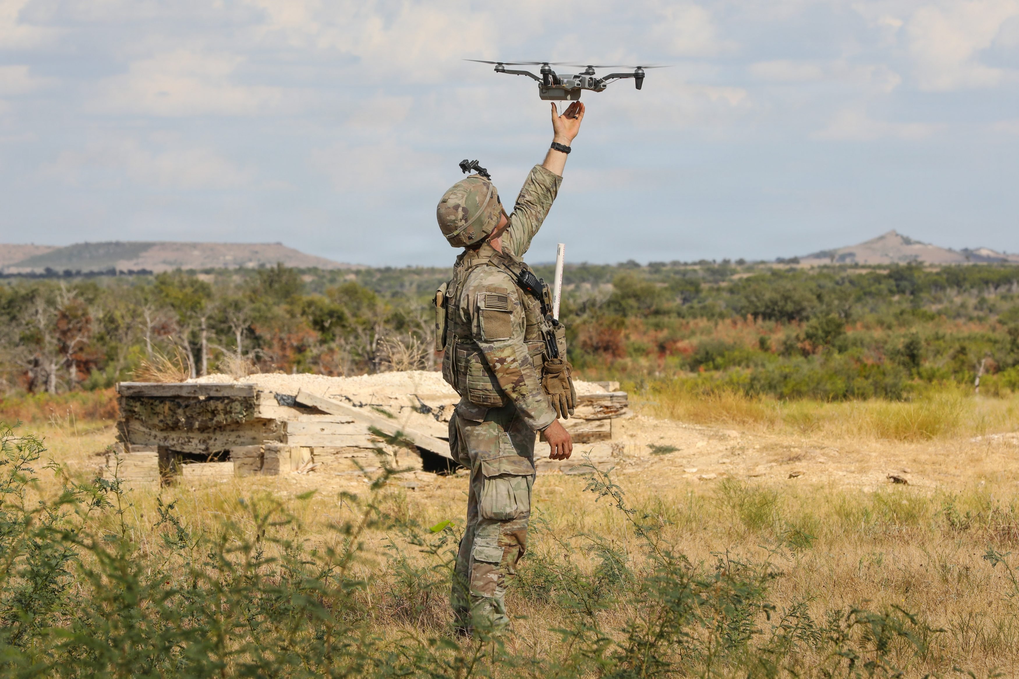 U.S. Army 1Lt. William Sumner, a scout platoon leader assigned to 2nd Battalion, 12th Cavalry Regiment, 1st Brigade Combat Team, 1st Cavalry Division, acquires a small Unmanned Aircraft System during a multi-echelon live fire exercise on Fort Hood, Texas, Sept. 10, 2026. A multi-echelon live fire exercise is an integrated training event where multiple arms, services, and echelons of command synchronize and coordinate live fire support with maneuver forces to simulate real-world combat conditions. (U.S. Army photo by Pfc. Faleilelagi Lulu)