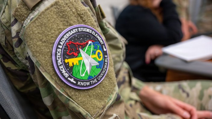A close-up view highlights the unit patch of the Space Tactics and Adversary Studies Element, worn by a participant at the Space Tactics Analysis Team working group (SpaceTAT’26) at U.S. Space Forces-Space (S4S) headquarters on Vandenberg Space Force Base, Calif., June 29, 2026. Spearheaded by the U.S. Space Force’s Combat Forces Command alongside staff from S4S, the working group brought together U.S. and Five Eyes coalition space operators, system experts, and intelligence professionals. The analysis from the event provides the tactical foundation for the annual Weapons and Tactics Conference, equipping today’s Guardians and coalition partners to counter current threats.