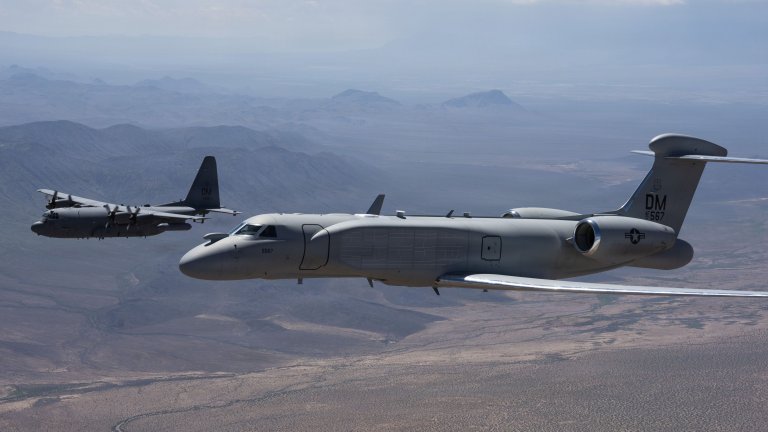 A U.S. Air Force EC-130H Compass Call aircraft and an EA-37B Compass Call aircraft assigned to the 55th Electronic Combat Group fly in formation over Southern Arizona, Sept. 3, 2026. Together in formation for the first time, the aircraft symbolize the continuation of a critical combat capability that enables U.S. and coalition forces to disrupt, deny and degrade adversary command and control networks. (U.S. Air Force photo by Senior Airman Devlin Bishop) 