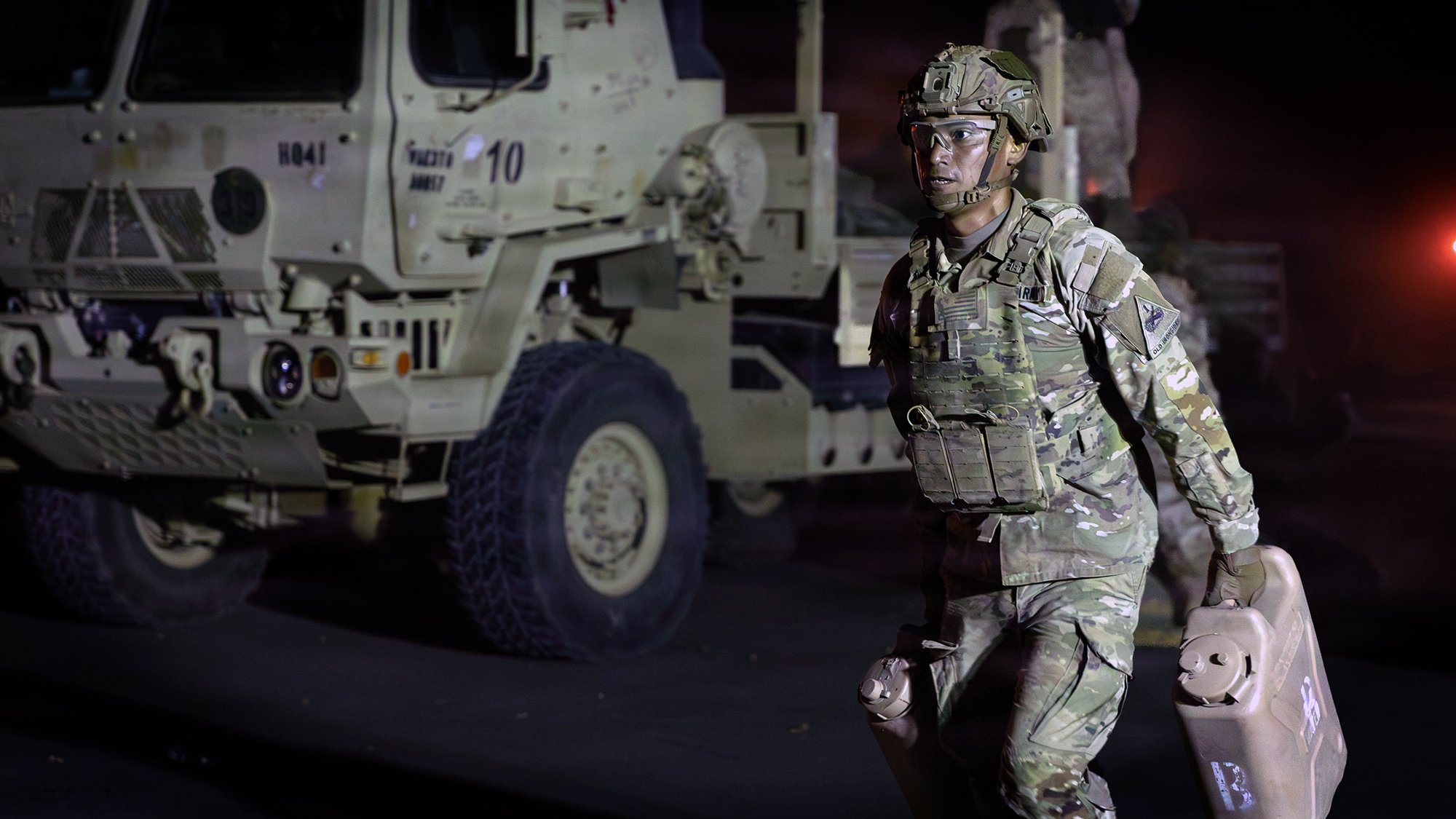 A U.S. Soldier assigned to the 36th Infantry Regiment, 1st Armored Division, carries water canisters during the expert physical fitness assessment at Novo Selo Training Area, Bulgaria, on Aug. 31, 2026. The Expert Infantry Badge and the Expert Soldier Badge challenges Soldiers through a series of individual events designed to assess physical readiness, technical proficiency and the ability to perform under pressure. Each event tests different skills and capabilities, contributing to the development of confident, capable Soldiers and a ready force. (U.S. Army Reserve photo by Sgt. Alexandria Romanack)
