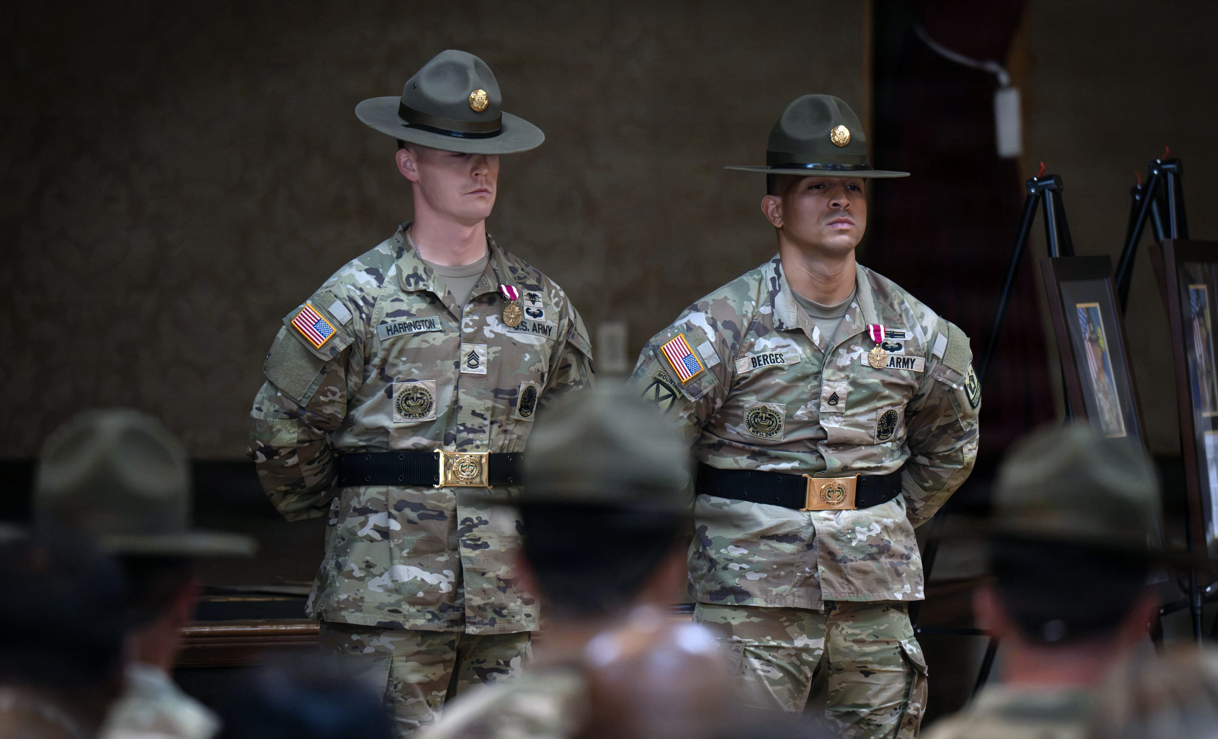U.S. Army Reserve Sgt. 1st Class Kevin Harrington, the 2026 U.S. Army Reserve Drill Sergeant of the Year, and U.S. Army Staff Sgt. Noel Berges, 2026 U.S. Army Drill Sergeant of the Year, stand at parade rest during an award ceremony held at the end of the U.S. Army Drill Sergeant of the Year Competition, Sept. 16, 2026, at Fort Jackson, South Carolina. Drill sergeants of the year serve in unique assignments at centers of excellence while the overall winner serves as the U.S. Army Drill Sergeant of the Year on the USAREC staff.