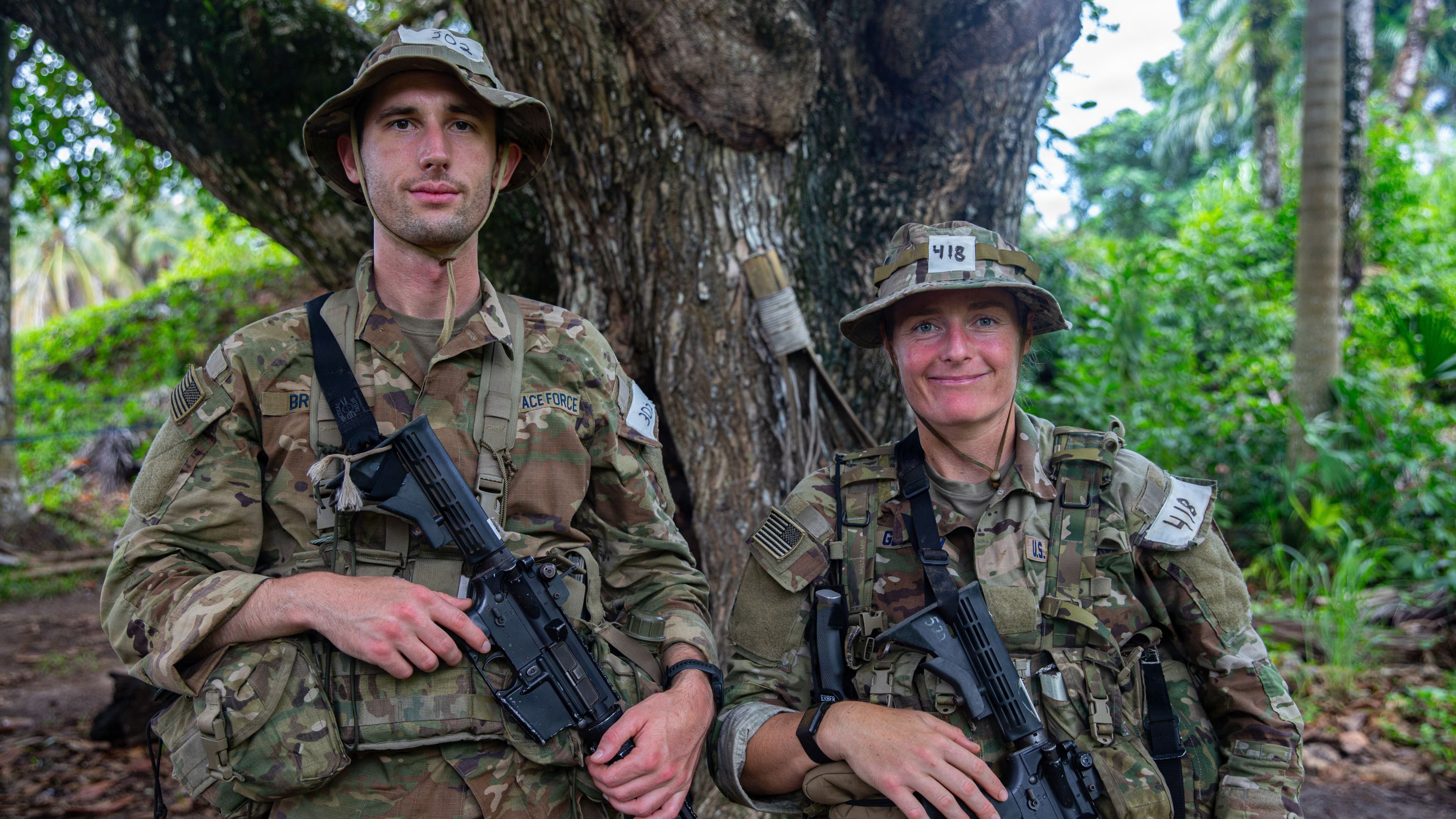 U.S. Space Force Capt. Stephen Brown, left, and Maj. Alyson Gleason, students in the Jungle Operations Training Course- Panama, pose for a photo during fauna and flora procurement at Aeronaval Base Cristóbal Colón, Panamá, Sept. 12, 2026. Students in the JOTC-P must learn about the essentials of survival such as identifying and utilizing objects and animals found in the jungle’s environment. (U.S. Army photo by Pfc. Oshon Trowbridge)