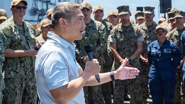 Hung Cao, Acting Secretary of the Navy (SECNAV), speaks to the crew of Wasp-class amphibious assault ship USS Makin Island (LHD 8) during an all-hands call on the flight deck, Aug. 7, 2026. SECNAV was recently in San Diego visiting various commands to speak with Sailors and their families, focusing on his top priority, “taking care of our people.” (U.S. Navy photo by Mass Communication Specialist Seaman Eric Nelson)