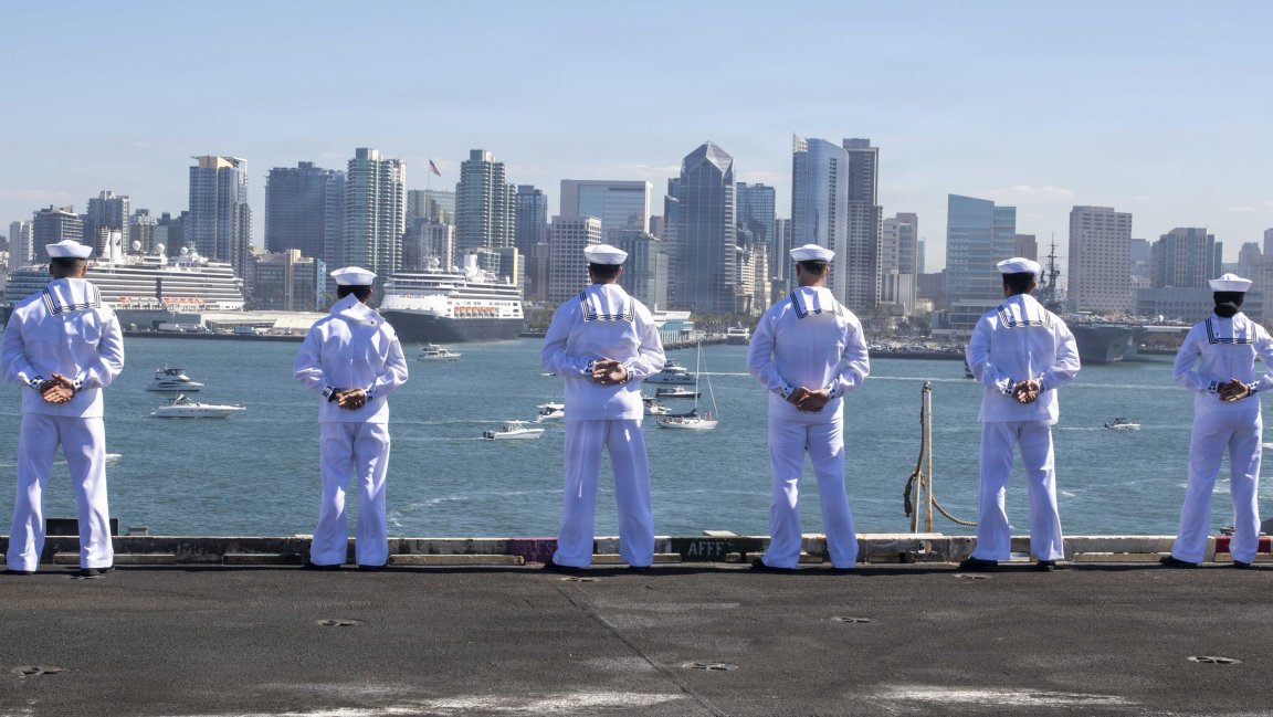 U.S. Sailors man the rails as Nimitz-class aircraft carrier USS Abraham Lincoln (CVN 72) returns to its homeport of San Diego following 10 months of operations in the U.S. 5th and 7th Fleet areas of operations, Oct. 8, 2026. An integral part of the U.S. Pacific Fleet, U.S. 3rd Fleet leads the naval forces in the region and provides the realistic, relevant training necessary to execute our Navy’s role across the full spectrum of military operations – from combat operations to humanitarian assistance and disaster response. U.S. 3rd Fleet works together with allies and partners to advance freedom of navigation and overflight, the rule of law and other principles that underpin security for the region. (U.S. Navy photo by Mass Communication Specialist ¬¬¬3rd Class Zoe Simpson)