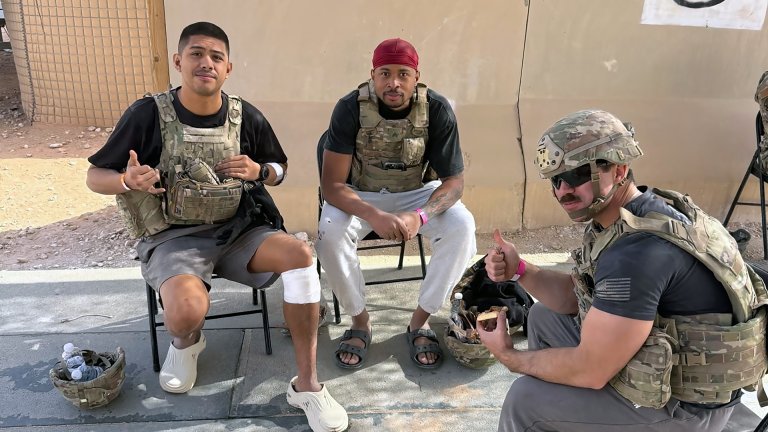 Staff Sgt. Kalob Mitchell, Sgt. Xavier Jones and Spc. Nicholas Cabo, all part of 6th Battalion, 56th Air Defense Artillery Regiment, 1st Cavalry Division Artillery, sit together after their initial medical evaluation on March 27 at the Role 2 Medical Facility at Prince Sultan Air Base in Al Kharj, Saudi Arabia. ( U.S. Army photo by Capt. Tyler Ritter, 6-56 Air Defense Artillery, DIVARTY)
