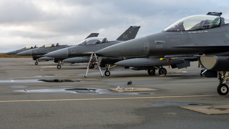 U.S. Air Force F-16 Fighting Falcons assigned to Eielson Air Force Base sit parked on the flight line at Eareckson Air Station, Alaska, during Operation NOBLE DEFENDER on Oct. 19, 2026. Staging tactical fighter aircraft at forward operating locations enhances homeland defense readiness and demonstrates rapid-deployment capabilities across remote arctic regions. (U.S. Air Force photo by Airman 1st Class Frank Houseton) 