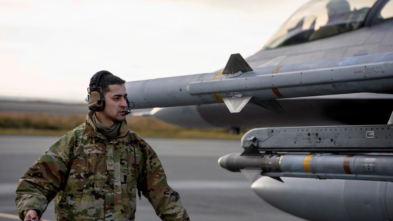 A U.S. Air Force maintainer performs preflight inspections on an F-16 Fighting Falcon at Eareckson Air Station, Alaska, during Operation NOBLE DEFENDER, Oct. 18, 2026. Through operations from dispersed locations, NOBLE DEFENDER strengthens the ability to rapidly position and sustain forces, integrate defensive capabilities, and deter potential threats to North America. (U.S. Air Force Photo by Maj. David Brown) 

