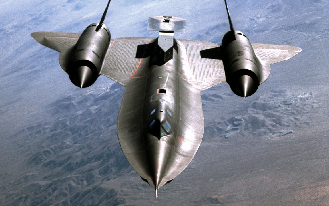 EC99-45065-6 This close-up, head-on view of NASA's SR-71A Blackbird in flight shows the aircraft with an experimental test fixture mounted on the back of the airplane. 1999 NASA /Photo Jim Ross NASA Identifier: 335912main_EC99-45065-6