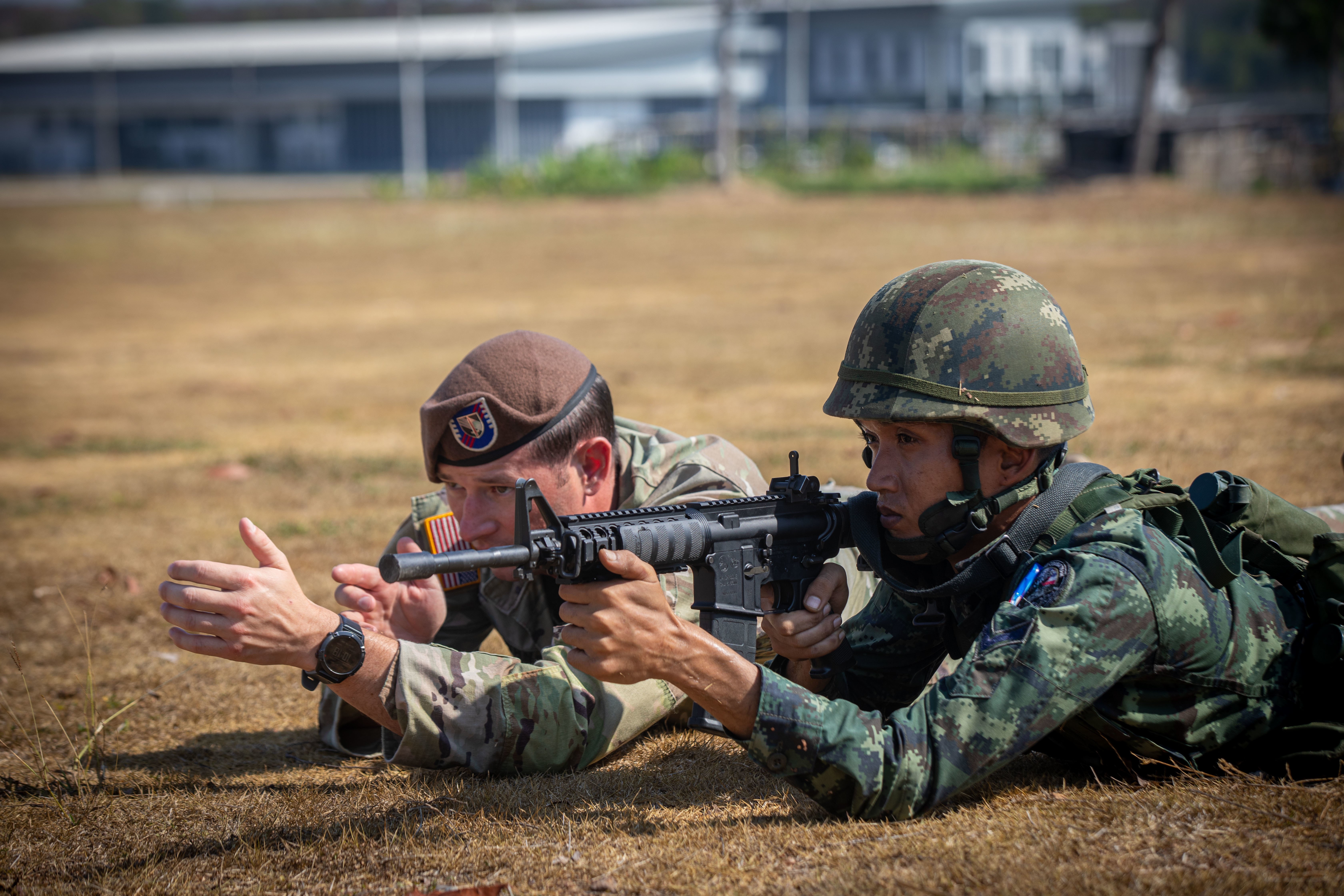 Maneuver Advisor Team 5221, 5th Security Force Assistance Brigade, provides instruction on movement and maneuver tactics as well as hand and arm signals in preparation during combat patrol training with the 112th Royal Thai Army Striker Battalion, 11th RTA Infantry Division, Jan. 15, 2023, in Ko Chan, Thailand. MAT 5221 will spend a total of six months working with members of the RTA in preparation for a rotation to the United States Military Academy's Sandhurst Competition at West Point, New York this spring.