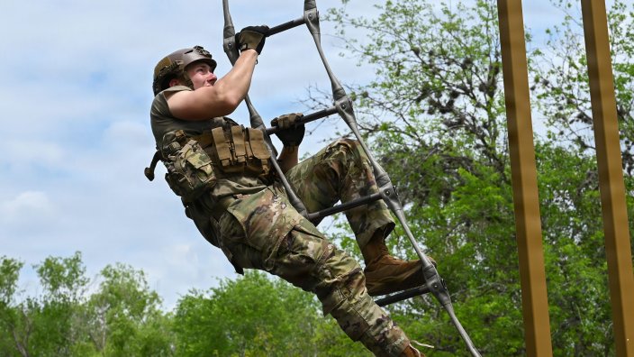 Candidates in Special Warfare Assessment and Selection complete an obstacle course at Joint Base San Antonio Lackland, Texas, April 16, 2026. The candidates must complete the obstacle course as a part of their SWAS training. Special Warfare Assessment and Selection is a rigorous, four-week course that selects candidates for special warfare career fields. They are assessed on eight key attributes, including physical fitness, water confidence, stress tolerance, and teamwork. (U.S. Air Force photo by Ava Leone)