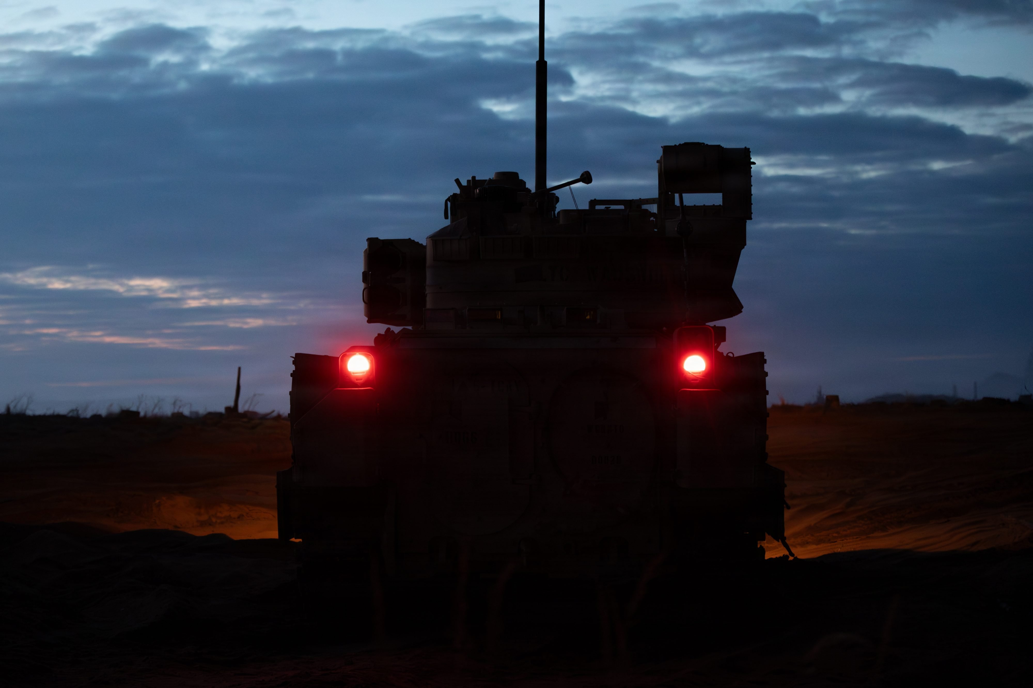 A U.S. M2A3 Bradley Infantry Fighting Vehicle assigned to 6th Squadron, 1st Cavalry Regiment, 1st Brigade Combat Team, 1st Armored Division, searches for an unmanned aerial system during Project Flytrap 5.0 at Pabradė Training Area, Lithuania, May 10, 2026. Project Flytrap is a counter-unmanned aerial system exercise designed to integrate emerging technologies and inform future Army requirements and doctrine. From April 27 to May 31, 2026, U.S. and Allied forces will conduct Project Flytrap within a series of linked exercises, including Sword 26, Saber Strike, Immediate Response, and Swift Response, transforming experimentation into capability. During Project Flytrap, Soldiers integrate counter-unmanned systems, AI-enabled command and control, and live data networks to move, decide, and fight more effectively across all domains. (U.S. Army Reserve photo by Sgt. Joseph Honce)